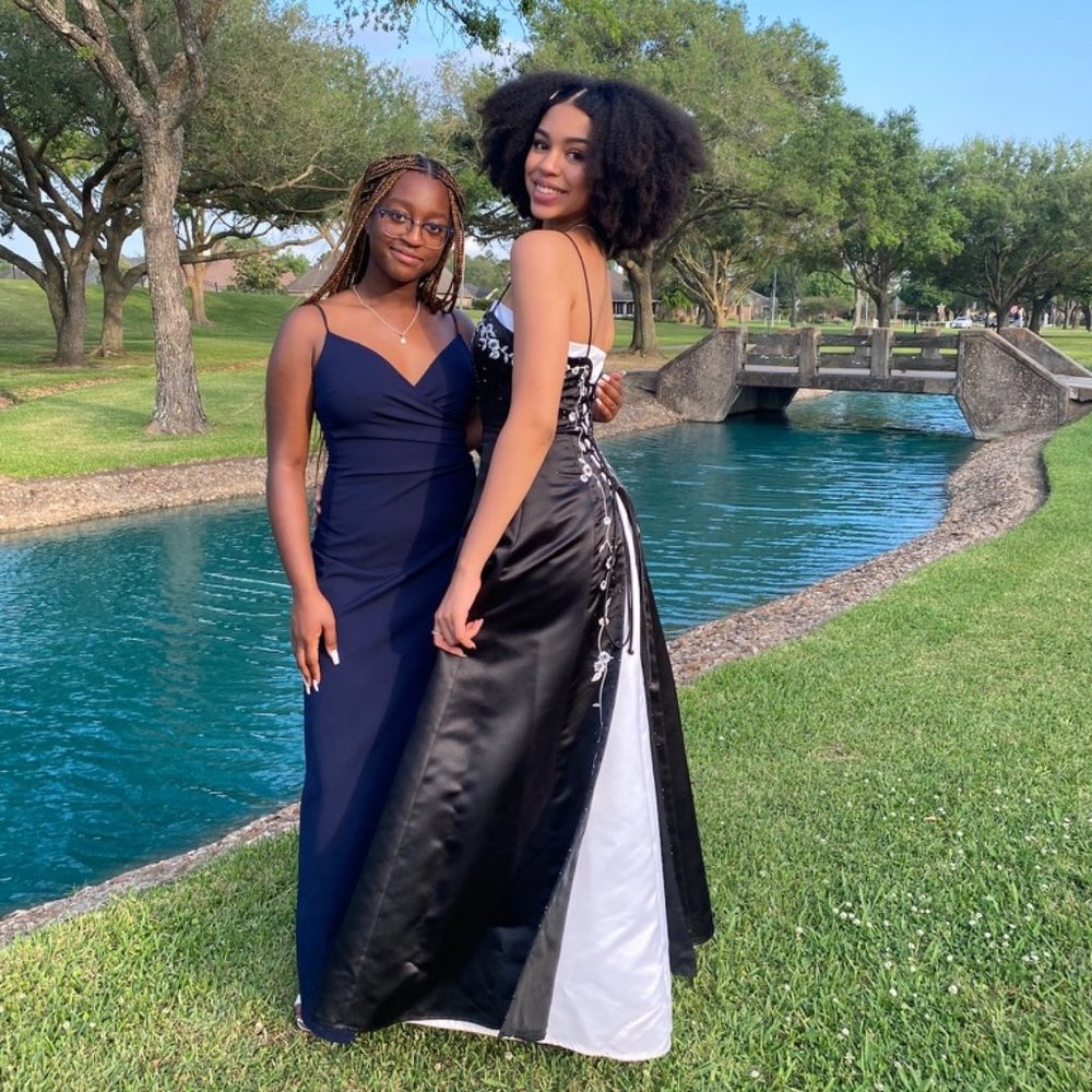 Black prom dress w/ beads, white embroidery and lace up back(worn once)